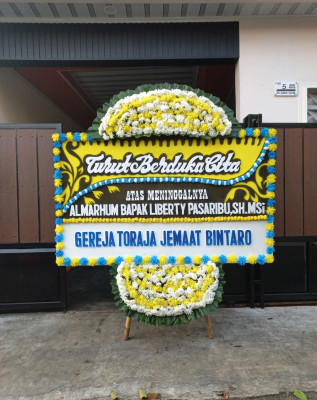 Papan Bunga Duka di Huta Barangan